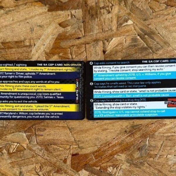 A pair of blue and yellow 5th Amendment cop cards